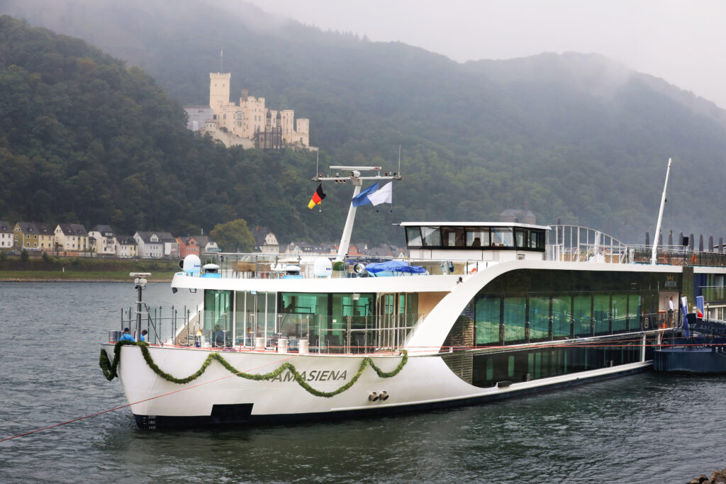 AmaWaterways AmaSiena river cruise ship sailing in the water.