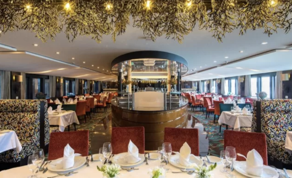 Main dining room tables inside the AmaWaterways river cruise ship the AmaSiena.