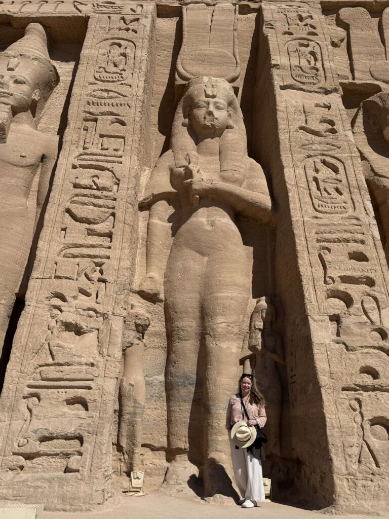 Travel Advisor Adventures by Terra standing next to Temple of Nefertari at Abu Simbel in Egypt